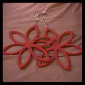 Two hot pink felt hangers